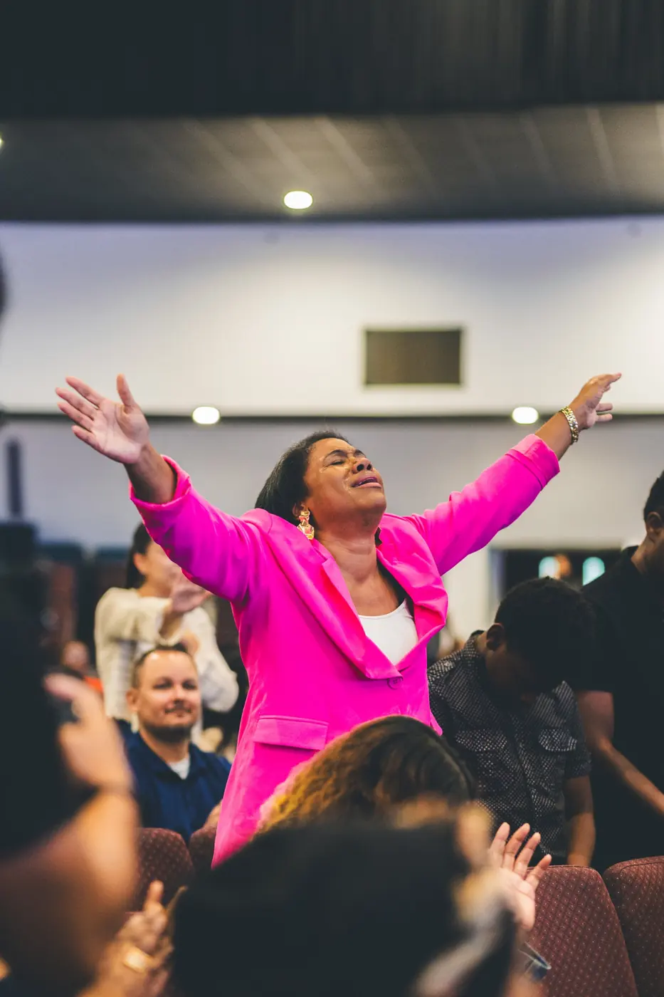 Worshipper with arms open wide